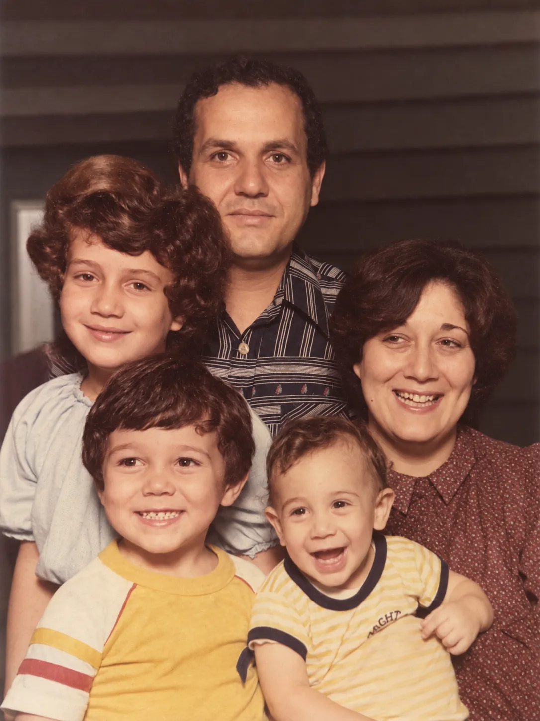 Vintage Afra family portrait with two adults and three children