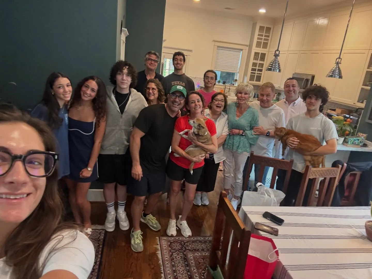 The extended Afra family gathered together at home