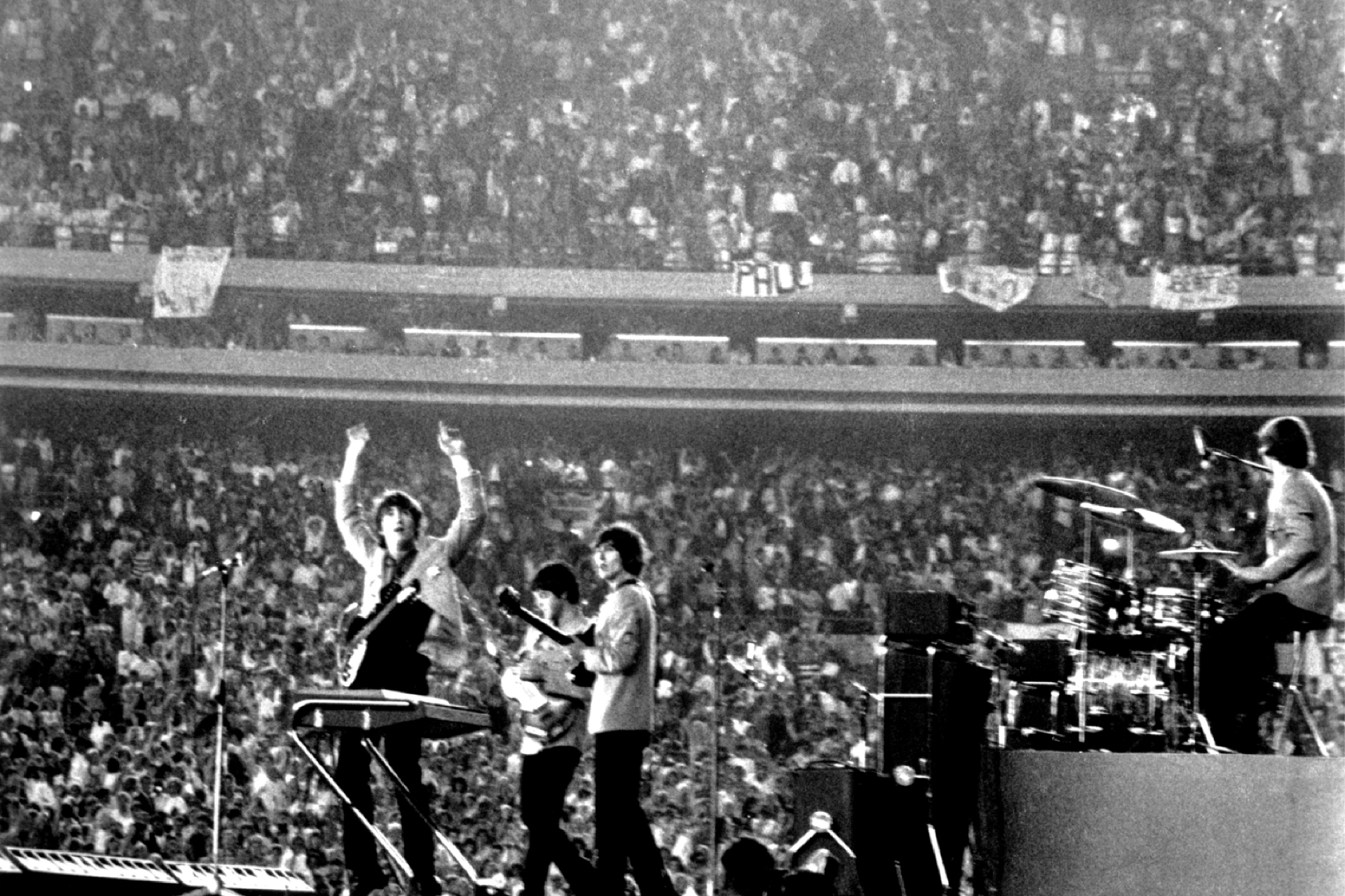 The Beatles performing at Shea Stadium in 1965 — a concert ticket cost five dollars