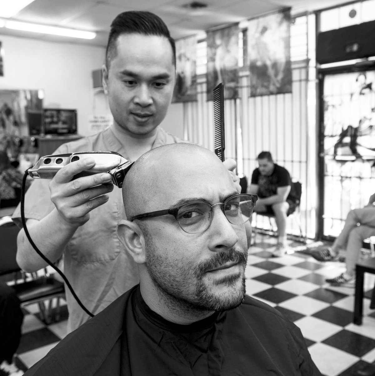 Omar Afra — Barbershop (Community Context) Omar Afra photographed at a barbershop in Houston